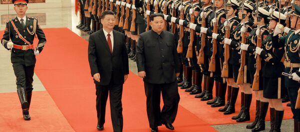北京での習近平国家主席と金正恩委員長 - Sputnik 日本