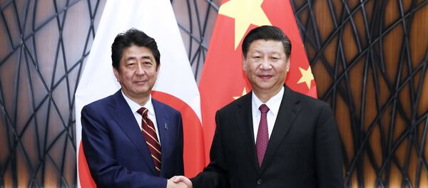 日本の安倍晋三首相と国の習近平国家主席(アーカイブ写真) 日本の安倍晋三首相と国の習近平国家主席(アーカイブ写真) - Sputnik 日本