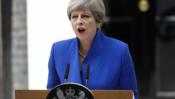 British Prime Minister Theresa May addresses the press in Downing street, London, Friday, June 9, 2017 following an audience with Britain's Queen Elizabeth II at Buckingham Palace where she asked to form a government.