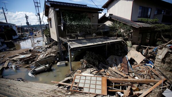 Разрушенные дома в результате ливневых дождей в Японии - Sputnik 日本