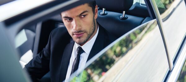 Бизнесмен в своем автомобиле Бизнесмен в своем автомобиле - Sputnik 日本