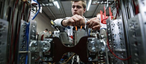 Участник фестиваля робототехники Участник фестиваля робототехники - Sputnik 日本