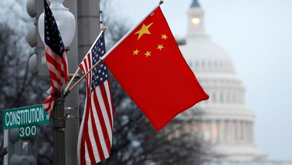 Флаги США и Китая в центре Вашингтона напротив здания Капитолия. Архивное фото - Sputnik 日本