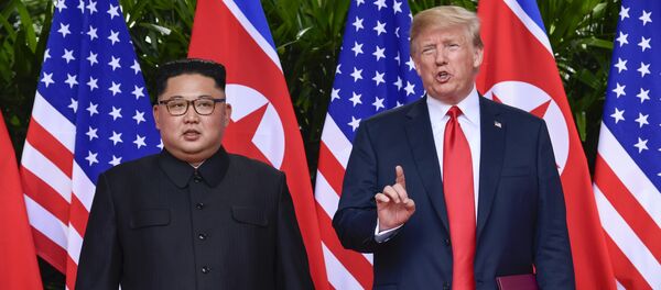 FILE - In this June 12, 2018, file photo, U.S. President Donald Trump makes a statement before saying goodbye to North Korea leader Kim Jong Un after their meetings at the Capella resort on Sentosa Island in Singapore - Sputnik 日本