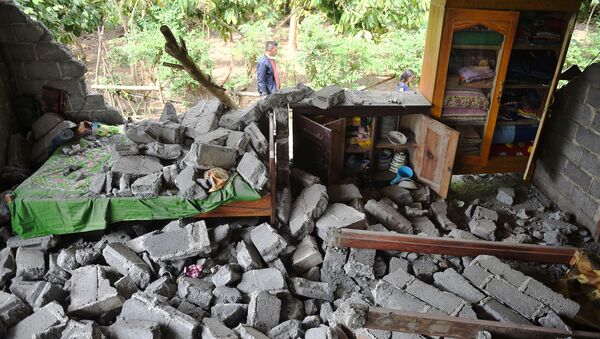 A damaged house is seen after an earthquake hit Sajang village in Lombok Timur, Indonesia, July 30, 2018 - Sputnik 日本