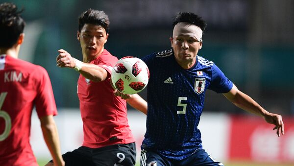 Футболисты в матче между Японией и Южной кореей на Азиатских играх 2018 - Sputnik 日本