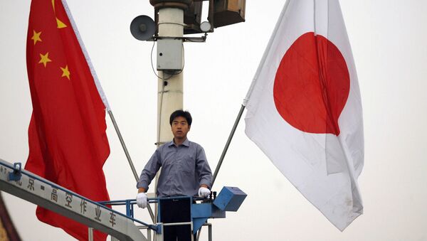 日本国旗と中国国旗 - Sputnik 日本