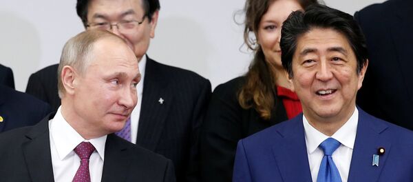 Vladímir Putin, presidente ruso, y Shinzo Abe, primer ministro de Japón Vladímir Putin, presidente ruso, y Shinzo Abe, primer ministro de Japón - Sputnik 日本