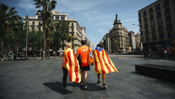 Участники акции сторонников независимости Каталонии в Барселоне - Sputnik 日本