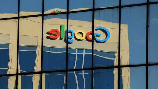 The Google logo is shown reflected on an adjacent office building in Irvine, California, U.S. August 7, 2017 - Sputnik 日本
