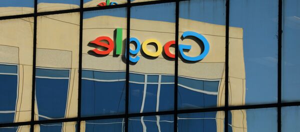 The Google logo is shown reflected on an adjacent office building in Irvine, California, U.S. August 7, 2017 - Sputnik 日本