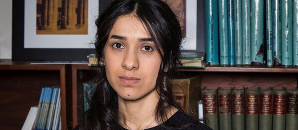 Yazidi survivor Nadia Murad poses for a portrait at United Nations headquarters in New York, U.S., March 9, 2017 Yazidi survivor Nadia Murad poses for a portrait at United Nations headquarters in New York, U.S., March 9, 2017 - Sputnik 日本