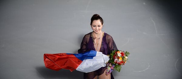 Росийская фигуристка Елизавета Туктамышева, завоевавшая золотую медаль в женском одиночном катании на чемпионате мира по фигурному катанию в Шанхае, на церемонии награждения Росийская фигуристка Елизавета Туктамышева, завоевавшая золотую медаль в женском одиночном катании на чемпионате мира по фигурному катанию в Шанхае, на церемонии награждения - Sputnik 日本