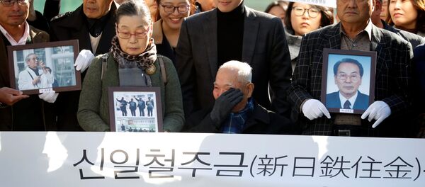 Жертва колониального правления Японией над Южной Кореей во время протеста в Сеуле Жертва колониального правления Японией над Южной Кореей во время протеста в Сеуле - Sputnik 日本