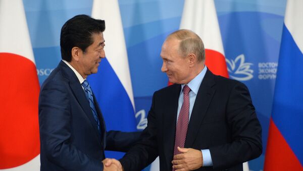 Shinzo Abe, primer ministro de Japón, y Vladímir Putin, presidente de Rusia - Sputnik 日本