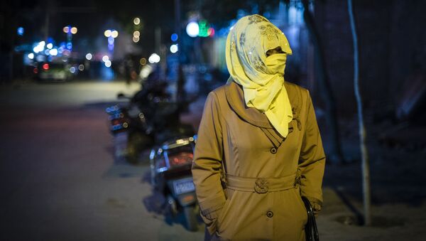 Уйгурская женщина в Китае - Sputnik 日本