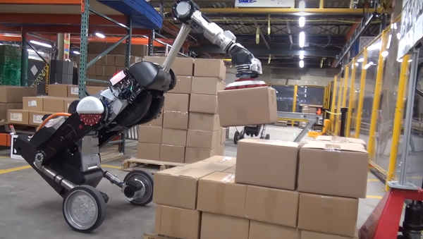 重い荷物を運んで丁寧に積み上げる：ボストン・ダイナミクスがロボットの新バージョンを公開 - Sputnik 日本