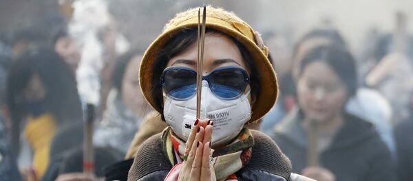 北京　お祈りしている女の人 - Sputnik 日本