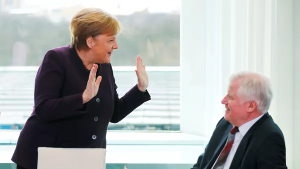 ドイツの内務大臣とメルケル首相 - Sputnik 日本