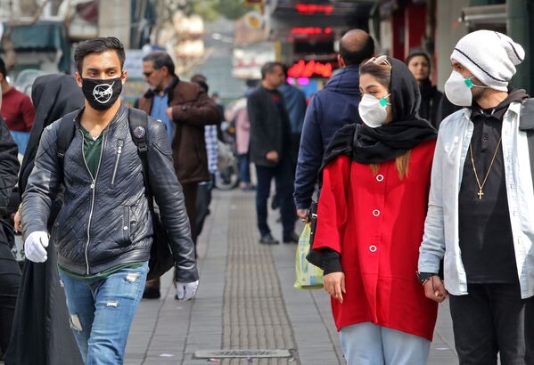 NASAのロゴのマスクをした男性（イラン・テヘラン） - Sputnik 日本