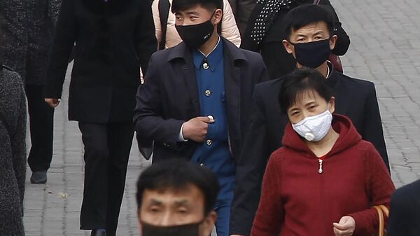 マスクをつけた北朝鮮国民 - Sputnik 日本