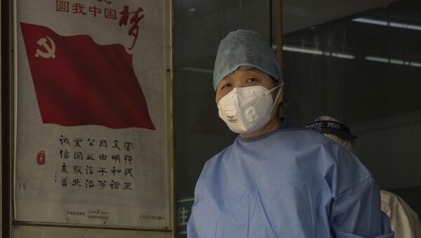 Медработник из провинции Ухань во время эпидемии коронавируса - Sputnik 日本