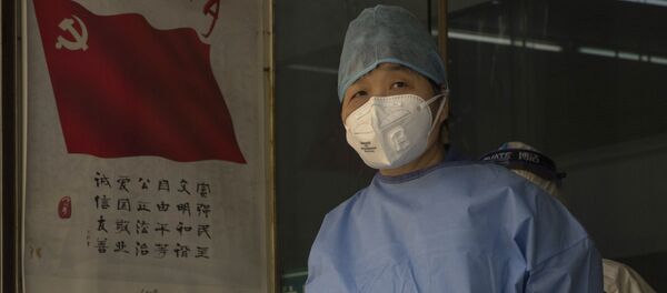 Медработник из провинции Ухань во время эпидемии коронавируса - Sputnik 日本