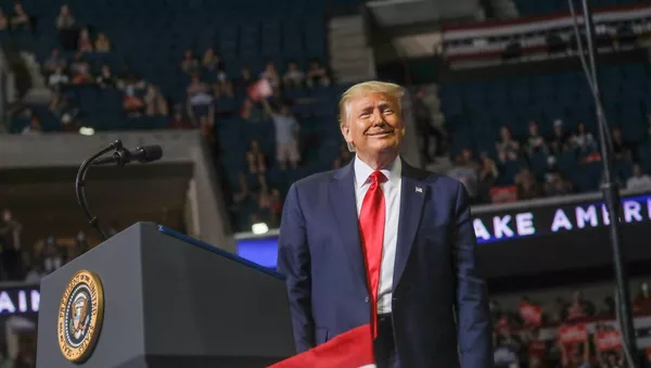 U.S. President Donald Trump smiles at the crowd as he arrives at the podium to speak during his first re-election campaign rally in several months in the midst of the coronavirus disease (COVID-19) outbreak, at the BOK Center in Tulsa, Oklahoma, U.S., June 20, 2020
