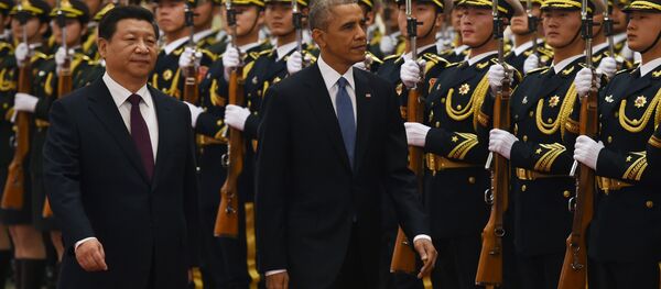 US President Barack Obama (C) reviews an honour guard with Chinese President Xi Jinping in the Great Hall of the People in Beijing on November 12, 2014 US President Barack Obama (C) reviews an honour guard with Chinese President Xi Jinping in the Great Hall of the People in Beijing on November 12, 2014 - Sputnik 日本